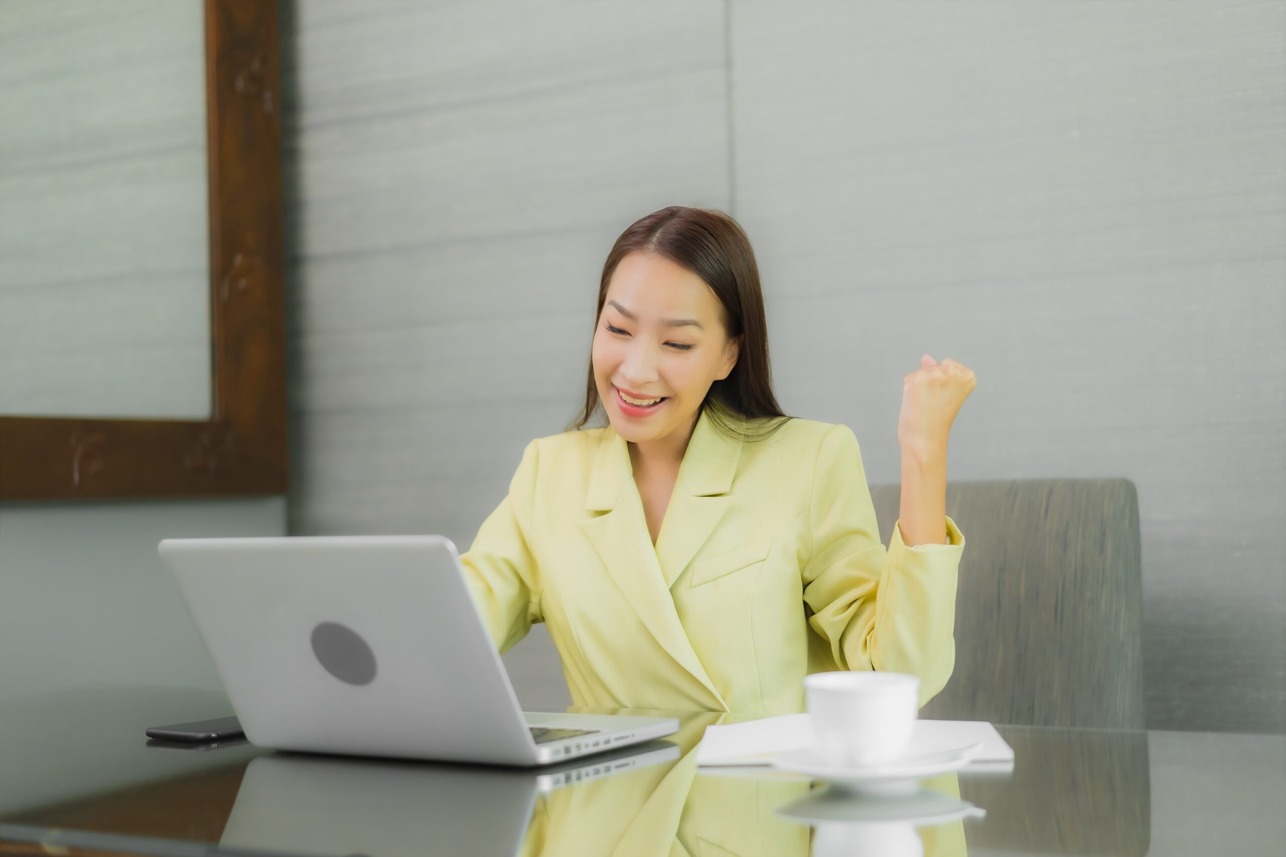 Portrait beautiful young asian woman use computer laptop with sm