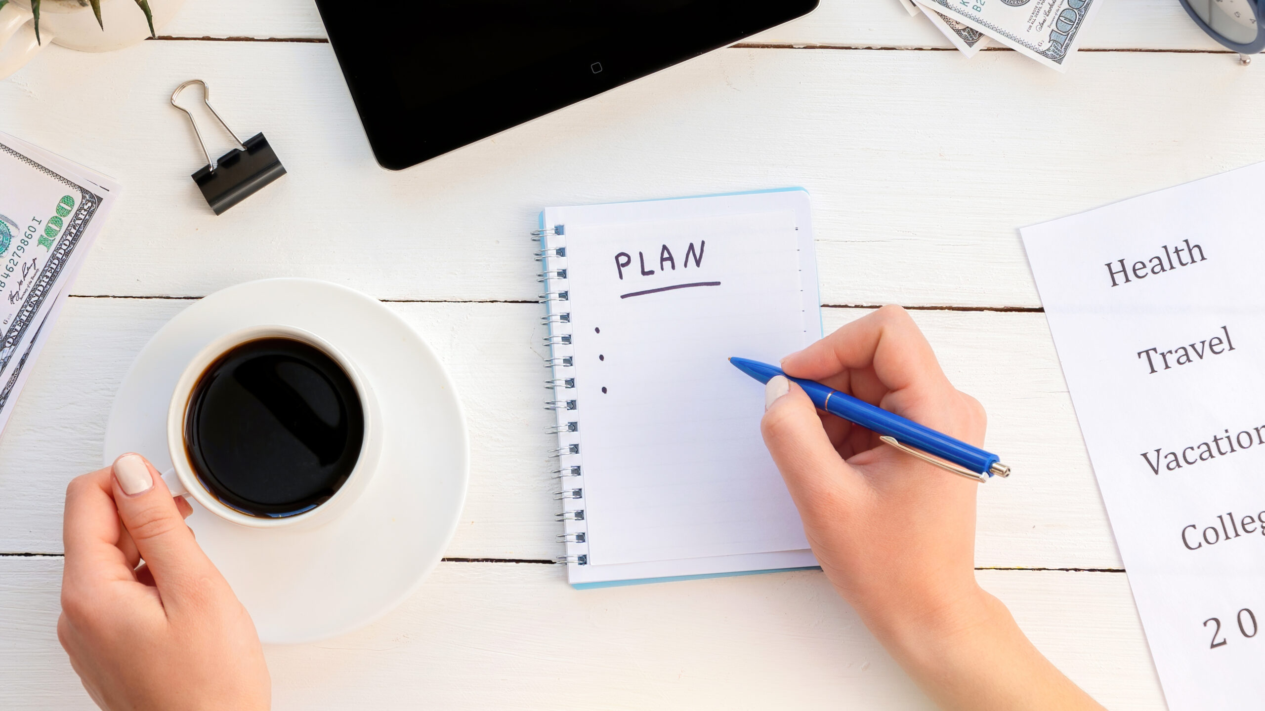 Female hands writing a to-do plan